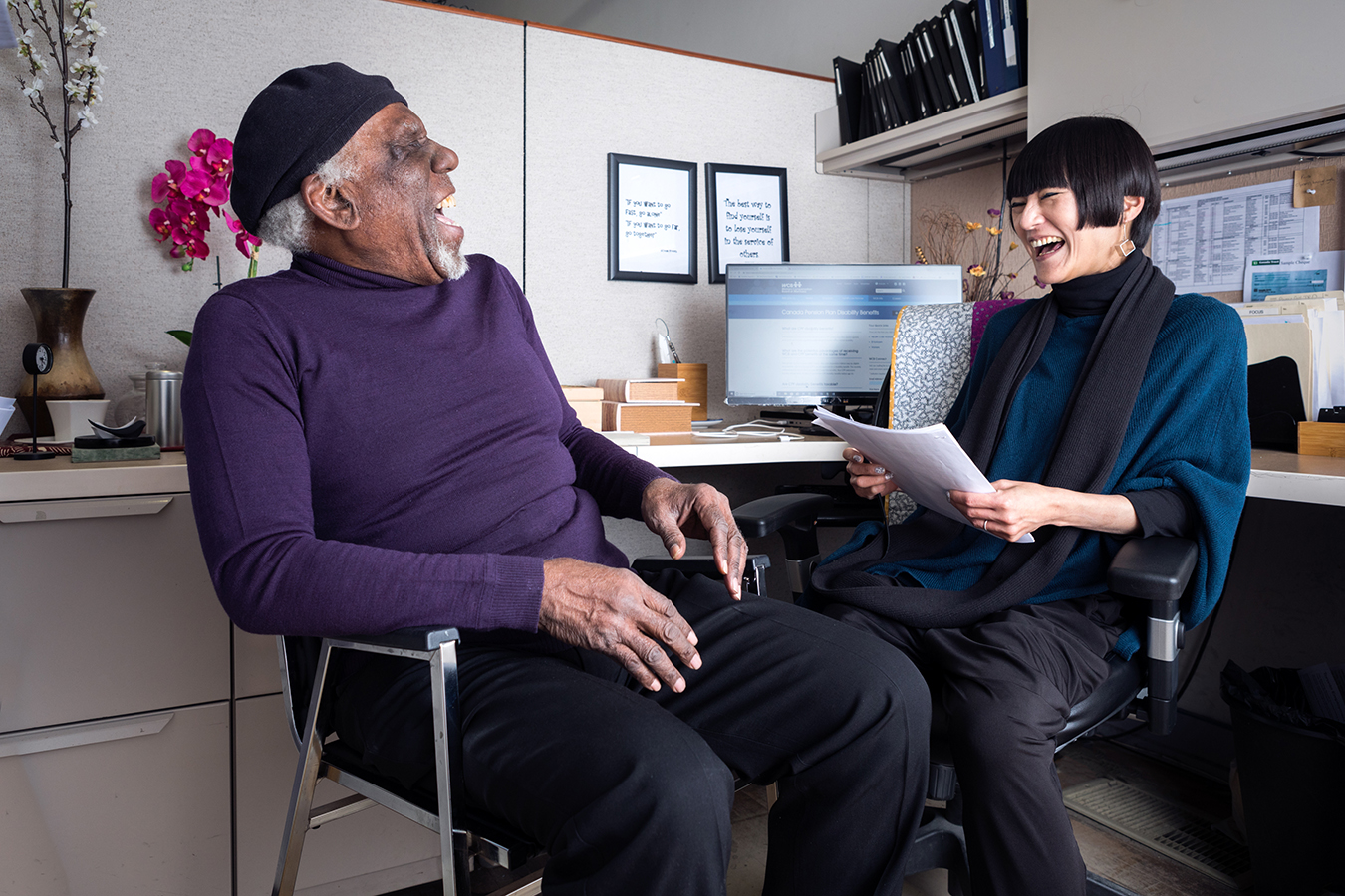 Toronto housing advocate Aiko Ito laughing with man in purple sweater