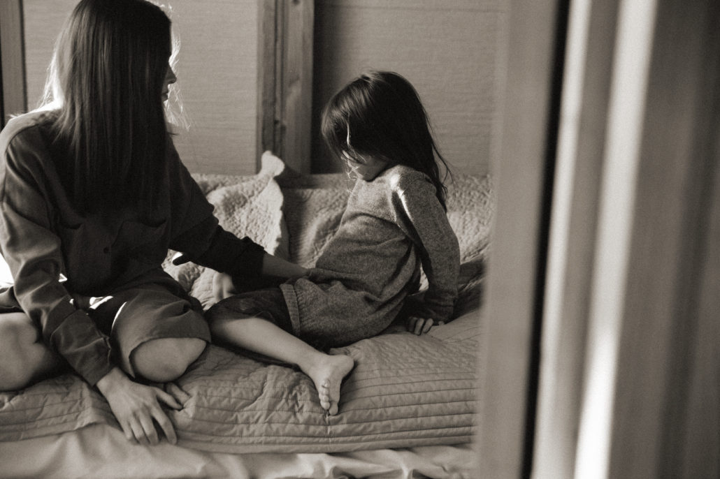 Photo of a mother talking to her daughter