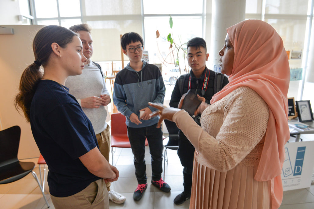 Sureya talking to a group of students