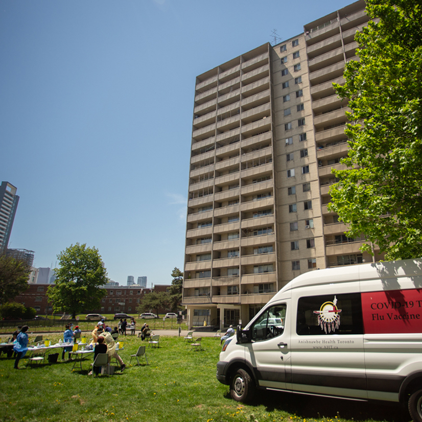 An Anishnawbe Health van parked at an outdoor clinic