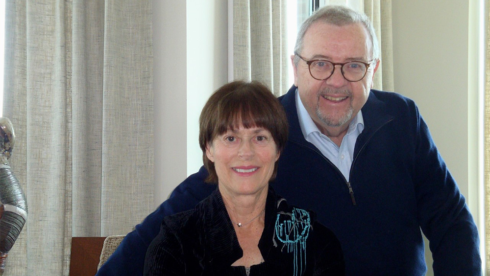 Bernard Dorval and Francine Côté sitting and looking at the camera