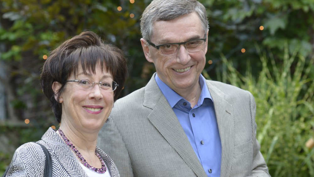 Gail Drummond and Bob Dorrance standing outside and looking at the camera