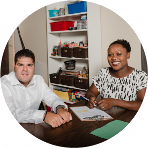 A man meeting with an employment counsellor in her office