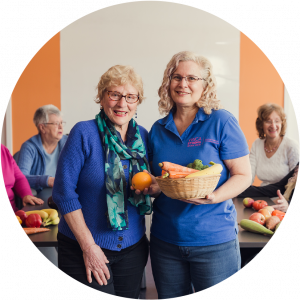 A group of seniors learning healthy food together