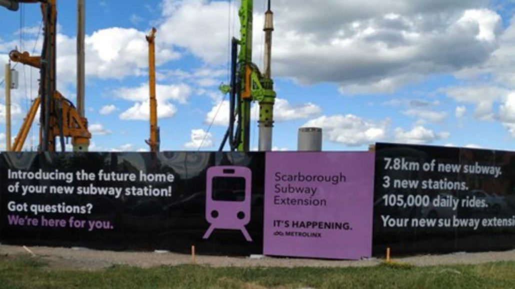 Hoarding surrounding drilling rigs for the Scarborough subway extensions.