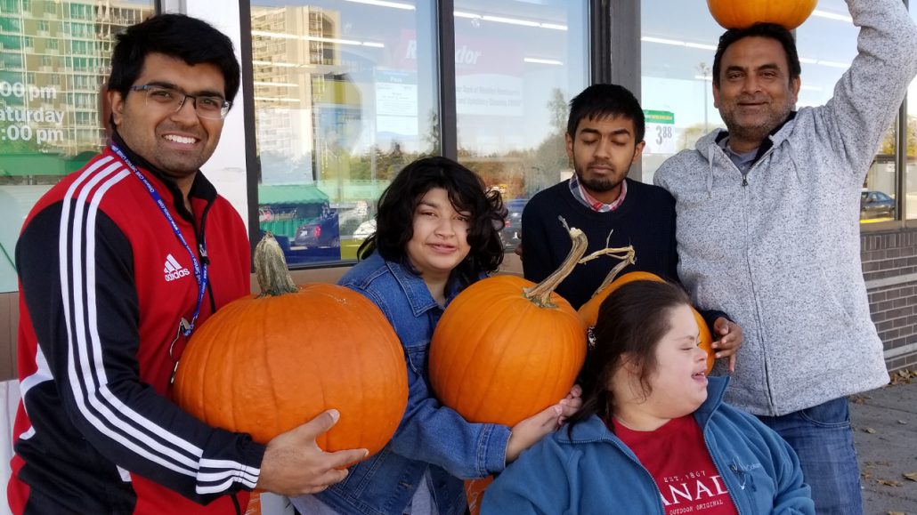 Photo of five people from DEEN Support Services.