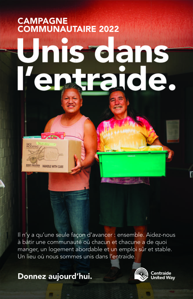 National Campaign Poster with two people smiling and holding food boxes.