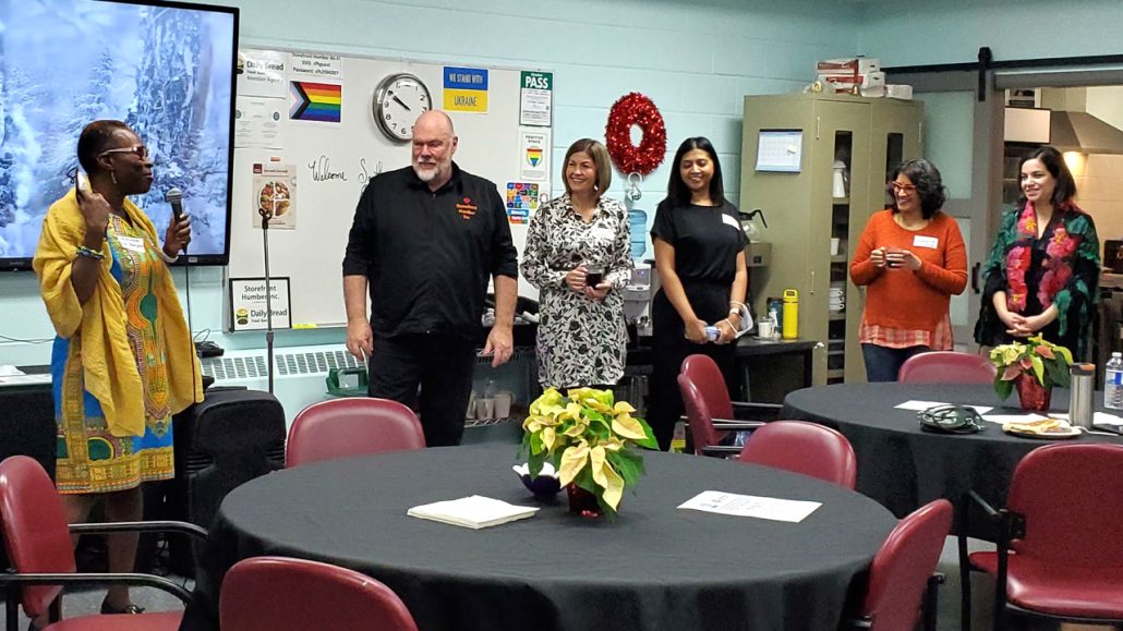 Agency and local government representatives gather at a community coordination table meeting. 