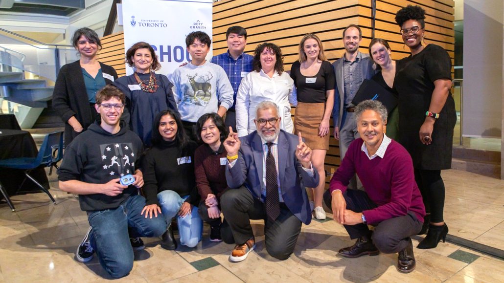 A group of graduates from the Leading Social Justice Fellowship pose together. 