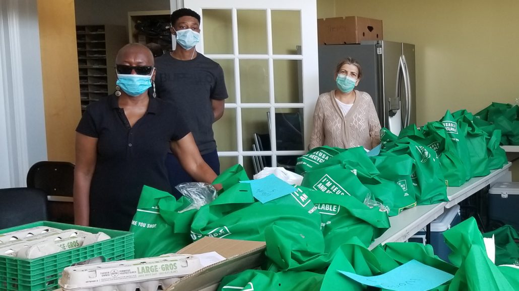 Volunteers assembling food packages