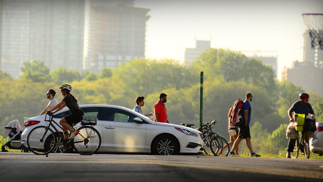 People walking and cycling at a Toronto park.