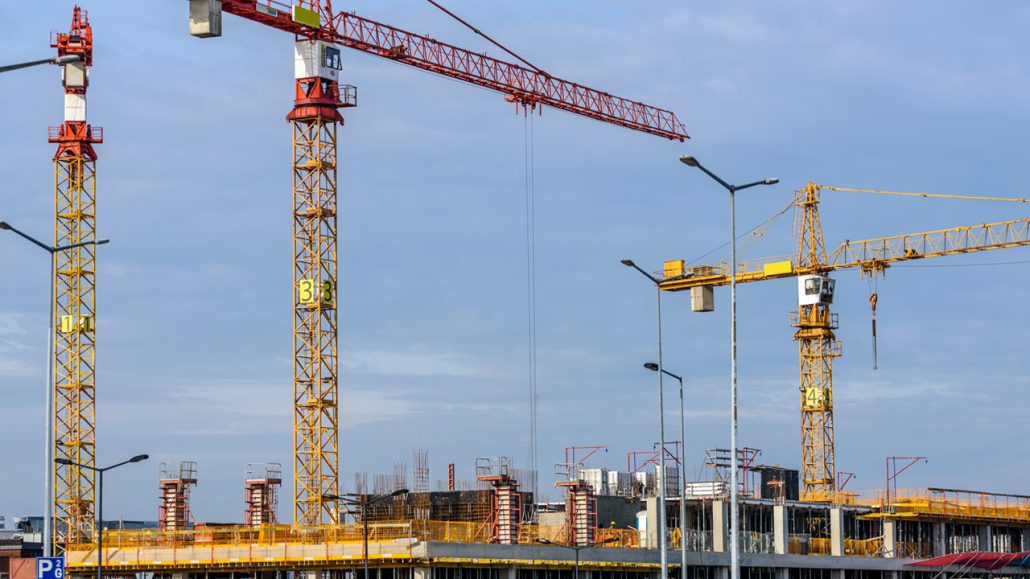 Construction cranes in a building develoment