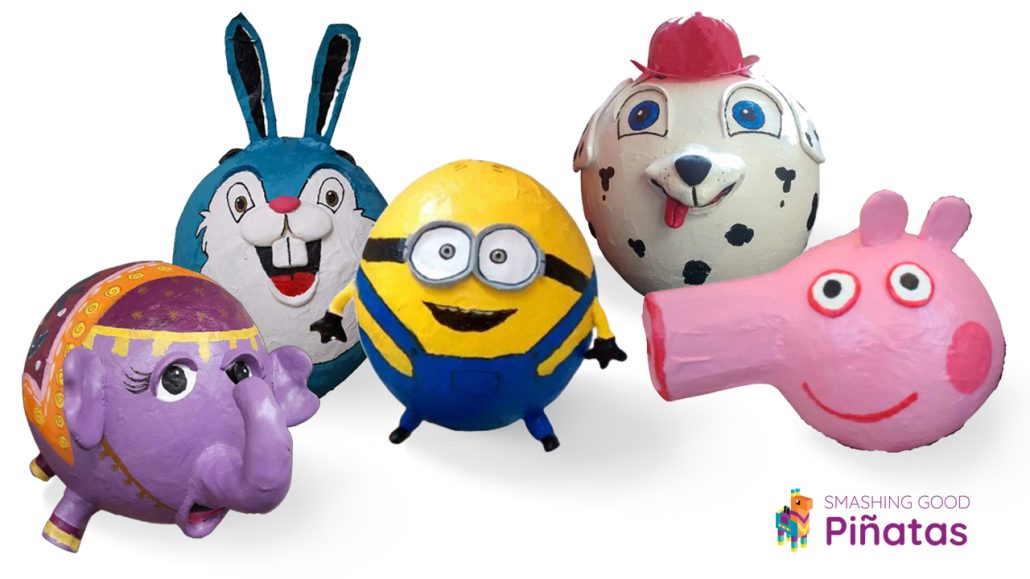 A variety of piñatas including one of Peppa Pig and one of a minion
