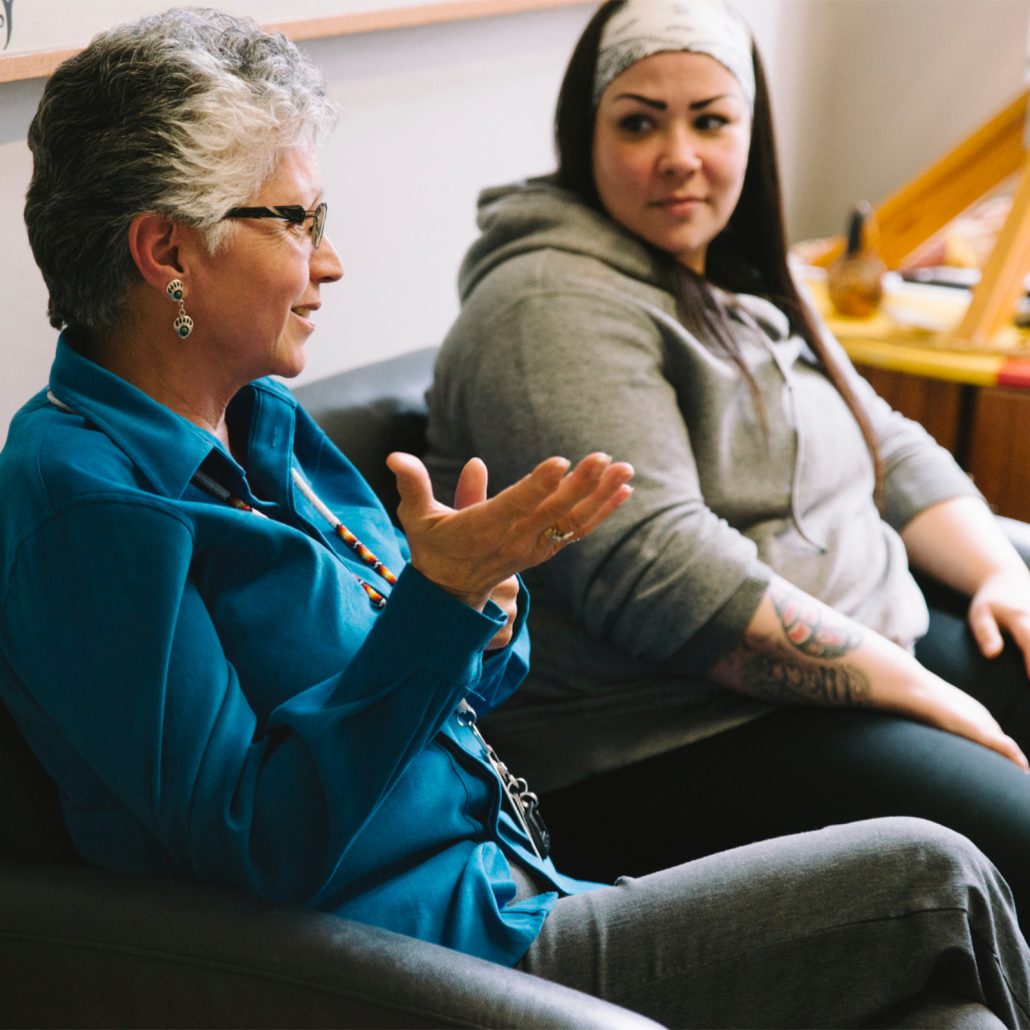 Two women talking in a United Way member agency