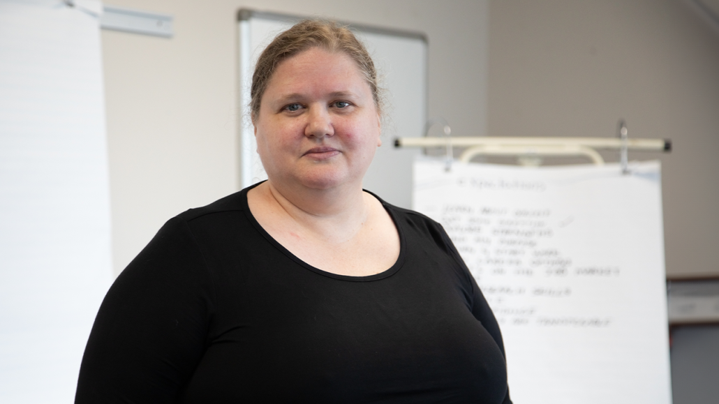 Jenifer, who received support from a United Way-funded women’s employment agency, looks straight at the camera.