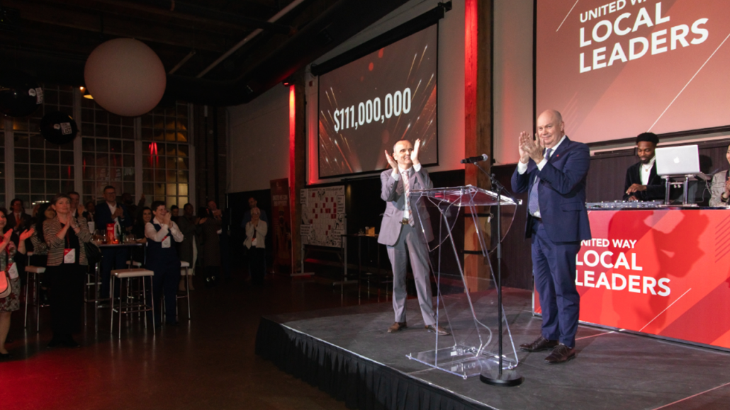 Daniele Zanotti, President and CEO of United Way Greater Toronto, and David Leonard, CEO of McCarthy Tetrault LLP and United Way 2023 Community Campaign Chair, announce that the organization surpassed its goal, raising a record $111 million.