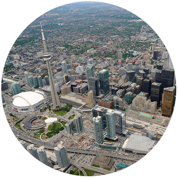 A high-angle view of the CN Tower and the city of Toronto.