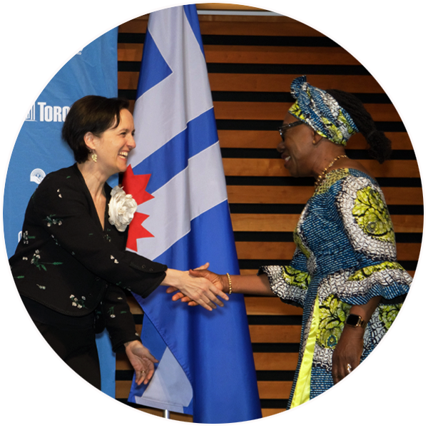 Heather McDonald, President and CEO of United Way Greater Toronto, shakes hands with a recipient of the Toronto Community Champion Awards.