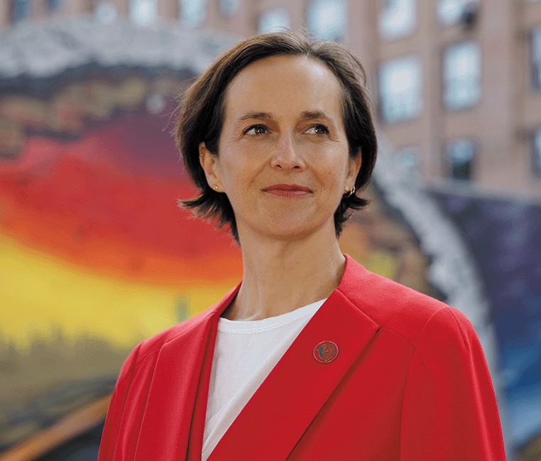 Heather McDonald standing in a streetscape