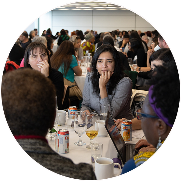 United Way members seated at a table, engaged in discussion.