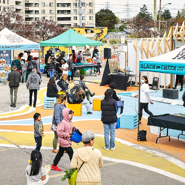 Community members gathered at the Jane Finch Corner Commons site at Jane Finch Mall.