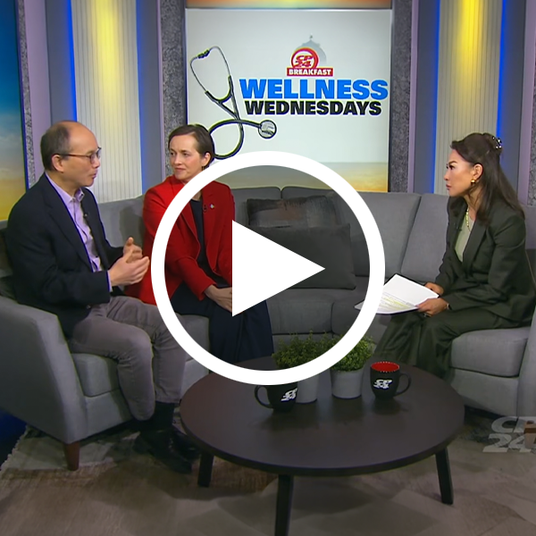 Video still with white “play” button showing United Way’s President & CEO Heather McDonald on CP24