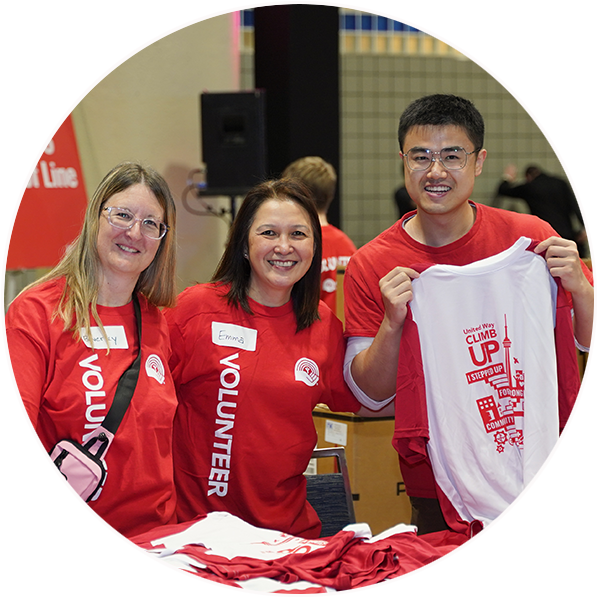 Three volunteers at United Way ClimbUP.