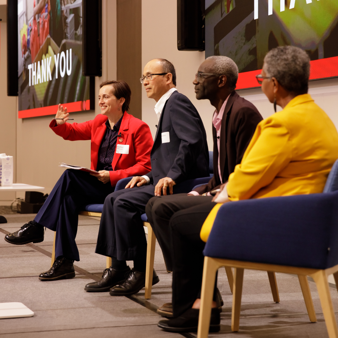 United Way President & CEO Heather McDonald sits onstage with other members at the 2026 Annual Meeting of the Members.