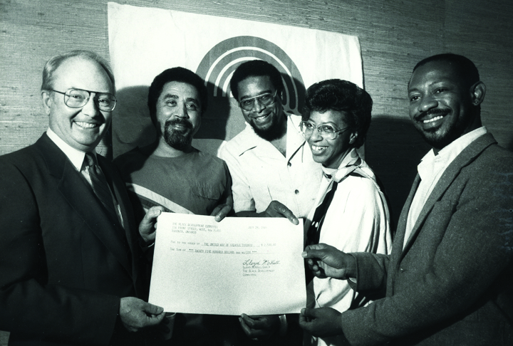 Members of the afro-caribbean community meet with United Way